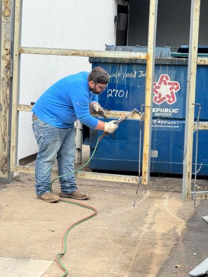 Matthew, owner of Iron Oak Welding & Fabrication, on the job